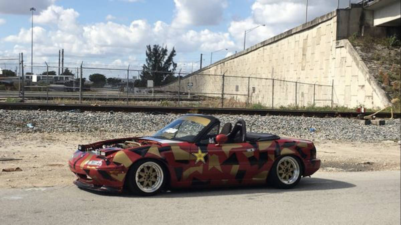Illustration for article titled At $2,500, Is This Custom 1992 Mazda MX-5 Miata a Book You Don’t Judge by its Cover?